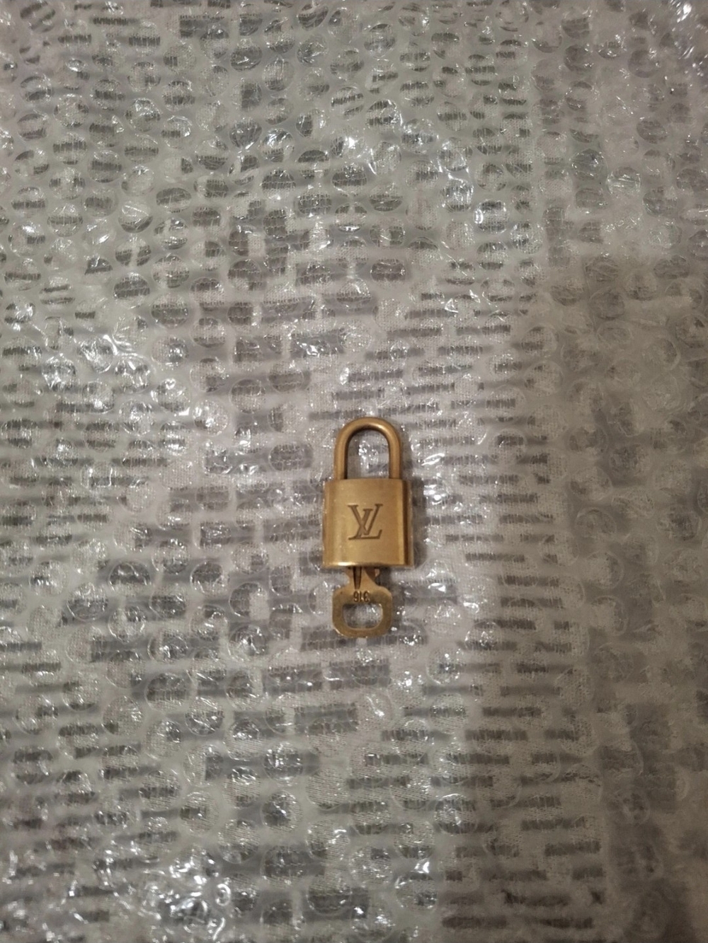 Louis Vuitton Gold-Tone LV Padlock Charm for Women Accessories (316)